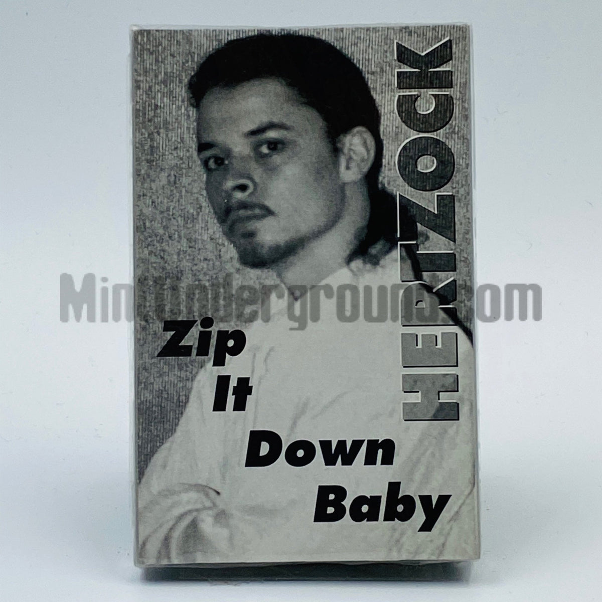 Hertzock – Zip It Down Baby Cassette Single, front cover