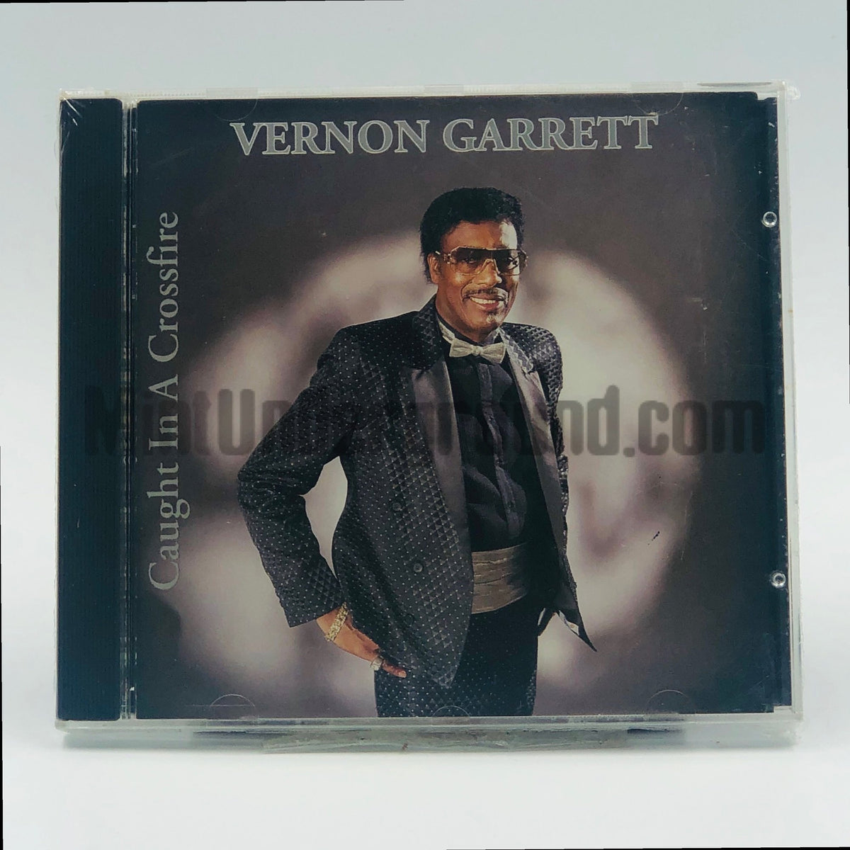 Vernon Garrett – Caught In A Crossfire CD, front cover